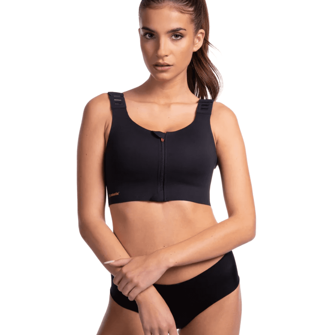 The LIPOELASTIC Pi Elite post surgery bra, a front fastening post surgery bra with a pink zip and adjustable clip straps
