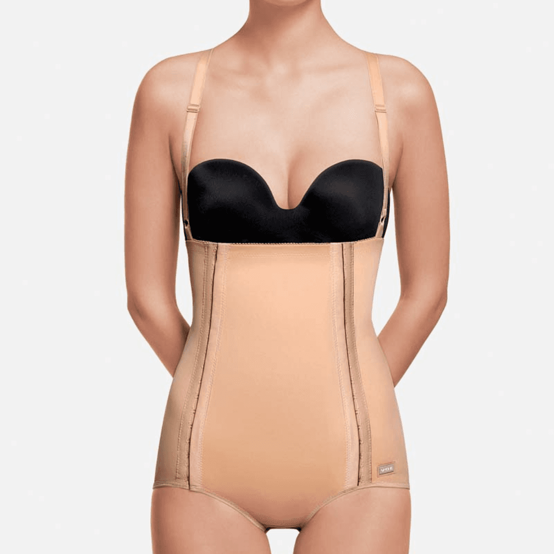 Image of Recova tummy tuck female supporter girdle with adjustable fasteners and double skin reinforcements. This compression garment offers optimal support and comfort for tummy tucks, C-sections, and abdominal liposuction procedures. Detachable shoulder straps provide versatility and easy customization.
