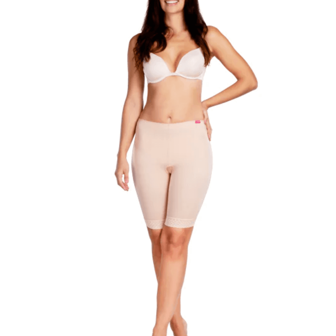 Discover the TF Comfort Garment, ideal for post-operative recovery after liposuction. Suitable for lower tummy, buttocks, pelvic area, hips, and thighs. Offers optimal compression and support. Double-lined fabric reinforces the lower abdomen. Soft lace hem prevents rolling or squeezing. Convenient zipper closures on both sides for easy dressing. Experience comfort and confidence in your recovery journey