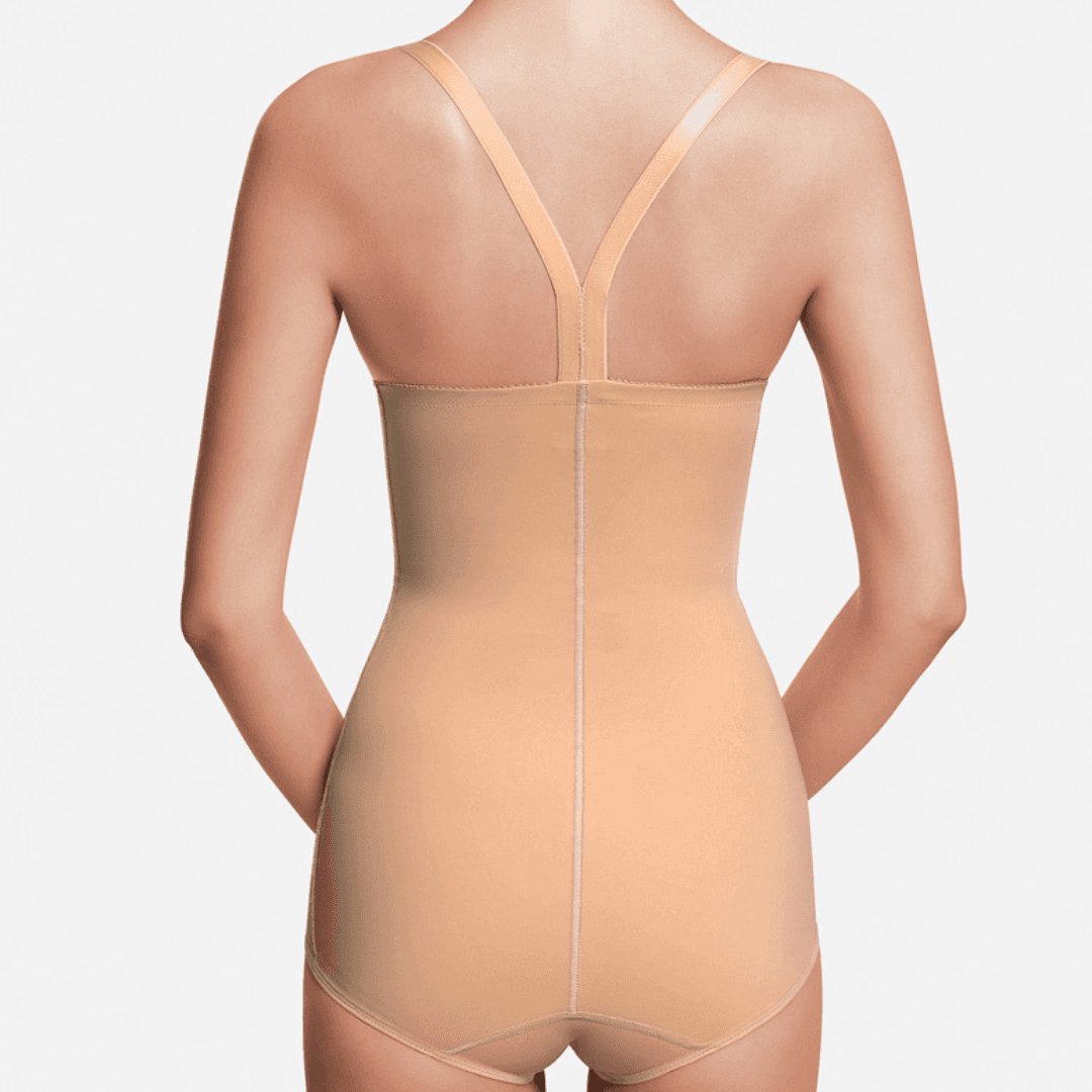 Image of Recova tummy tuck female supporter with adjustable fasteners and double skin reinforcements. This compression garment offers optimal support and comfort for tummy tucks, C-sections, and abdominal liposuction procedures.