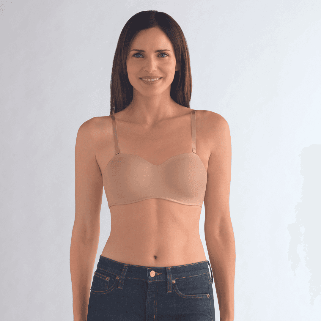 The Amoena Barbara is a strapless post-surgery bra with bi-lateral pockets for breast forms or prostheses. It offers versatile styling with multi-way straps and molded padded cups for a smooth silhouette and underwire support.