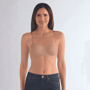 The Amoena Barbara is a strapless post-surgery bra with bi-lateral pockets for breast forms or prostheses. It offers versatile styling with multi-way straps and molded padded cups for a smooth silhouette and underwire support.