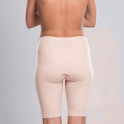 Discover the TF Comfort Garment, ideal for post-operative recovery after liposuction. Suitable for lower tummy, buttocks, pelvic area, hips, and thighs. Offers optimal compression and support. Double-lined fabric reinforces the lower abdomen. Soft lace hem prevents rolling or squeezing. Convenient zipper closures on both sides for easy dressing. Experience comfort and confidence in your recovery journey