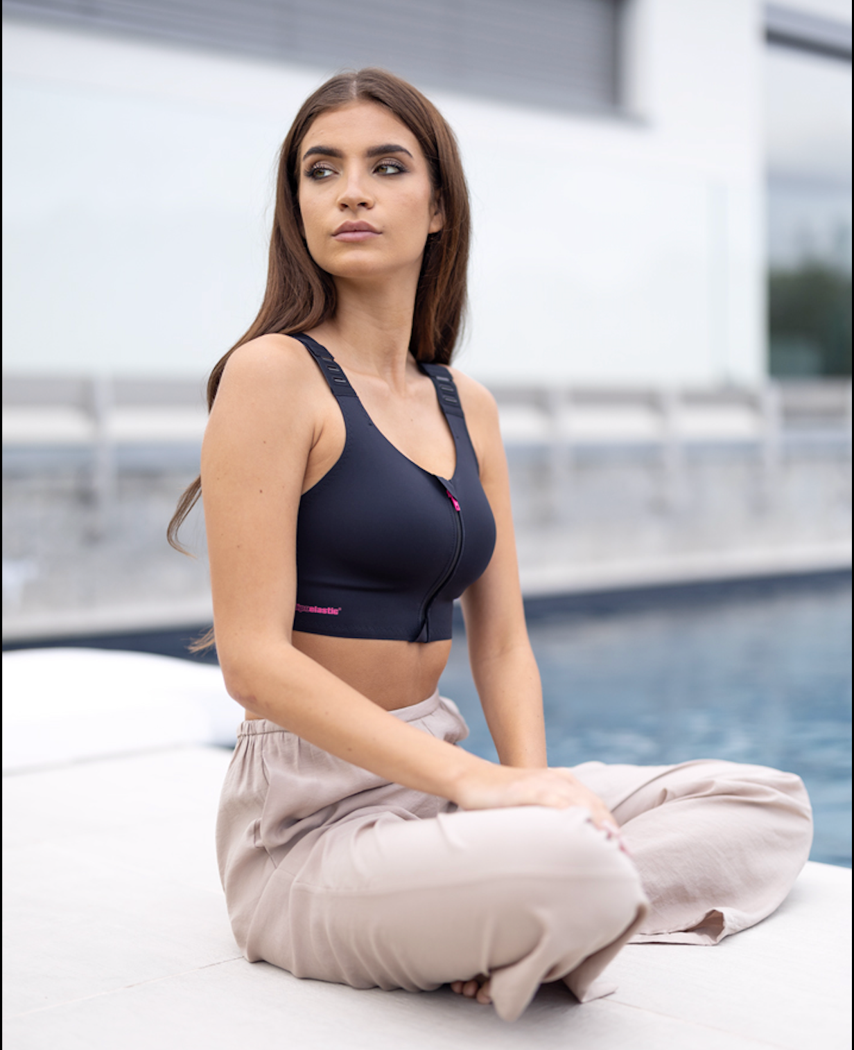 Woman wearing the lipoelastic pi elite post surgery bra 