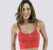 woman wearing the macom second stage bra in red, a wire free bra suitable from six weeks post surgery 