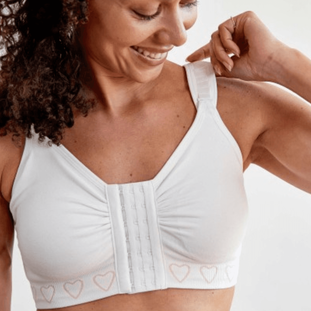 Cancer Research UK Post-Surgery Comfort Bra - Soft bamboo fabric bra designed for breast cancer patients. Offers comfort and support after mastectomy or breast cancer surgery. Available in white, black, and blush. Sizes range from Small to XXL. 100% net profits fund breast cancer research.