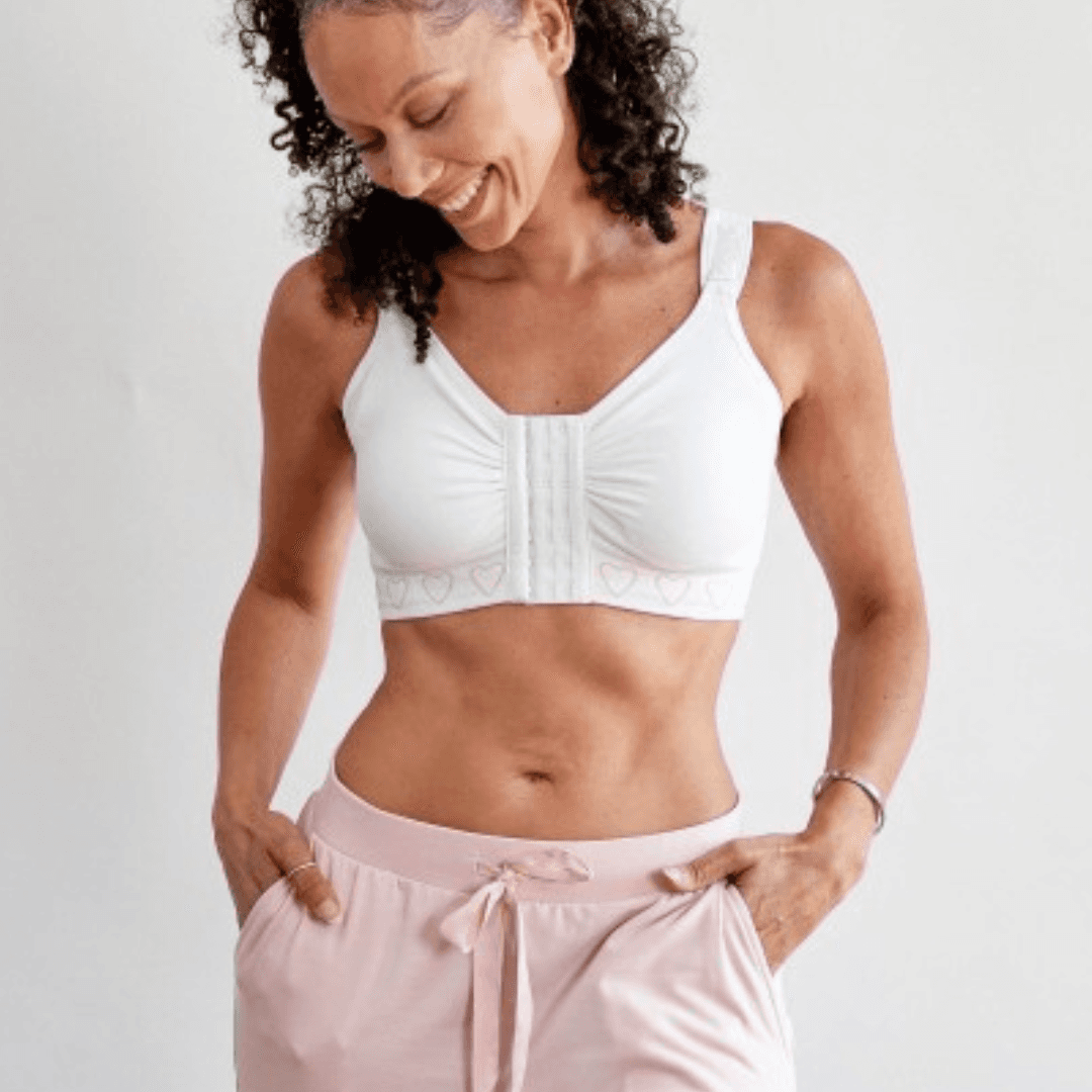 Cancer Research UK Post-Surgery Comfort Bra - Soft bamboo fabric bra designed for breast cancer patients. Offers comfort and support after mastectomy or breast cancer surgery. Available in white, black, and blush. Sizes range from Small to XXL. 100% net profits fund breast cancer research.