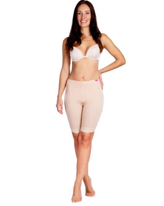Discover the TF Comfort Garment, ideal for post-operative recovery after liposuction. Suitable for lower tummy, buttocks, pelvic area, hips, and thighs. Offers optimal compression and support. Double-lined fabric reinforces the lower abdomen. Soft lace hem prevents rolling or squeezing. Convenient zipper closures on both sides for easy dressing. Experience comfort and confidence in your recovery journey