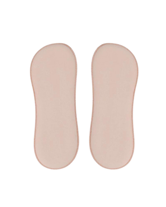  close-up image of Macom post-surgery flank inserts. These inserts are designed to provide comfortable and supportive and continuous compression after surgery, aiding in the recovery process.
