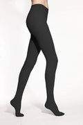 Black compression  tights worn by a person on a white background