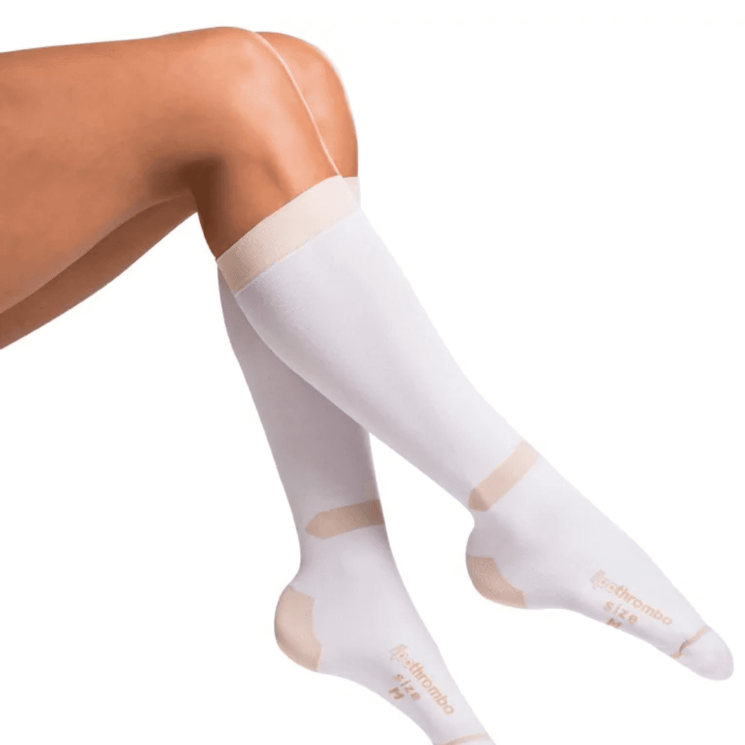 Unisex LIPOTHROMBO AD compression stockings, knee-high design, with graduated compression for DVT prevention, featuring a white finish and easy-access toe opening.