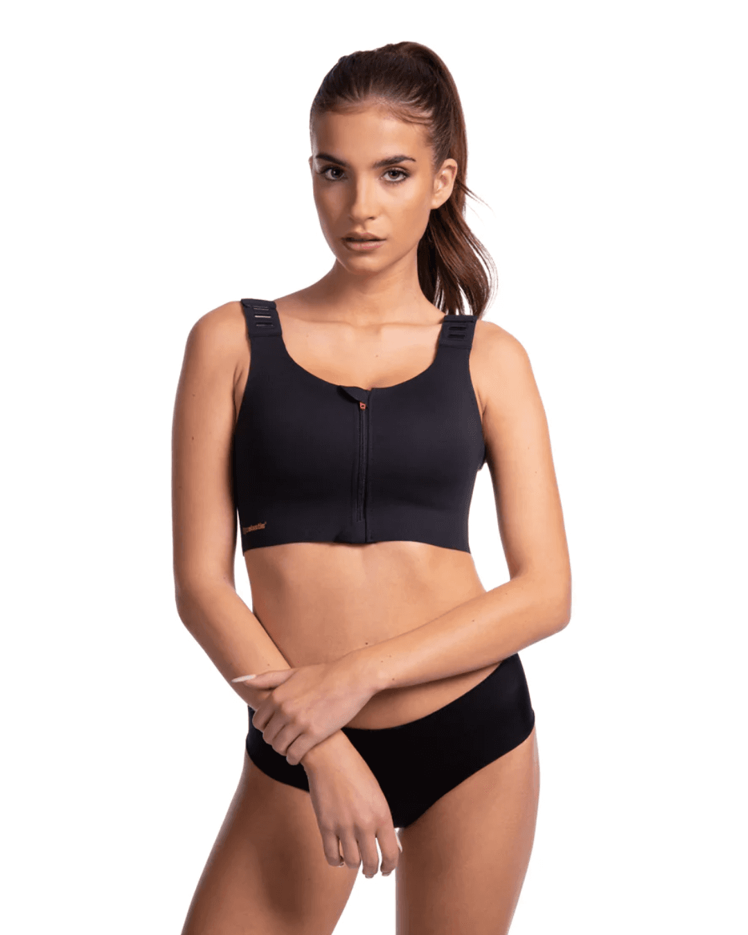 The LIPOELASTIC Pi Elite post surgery bra, a front fastening post surgery bra with a pink zip and adjustable clip straps