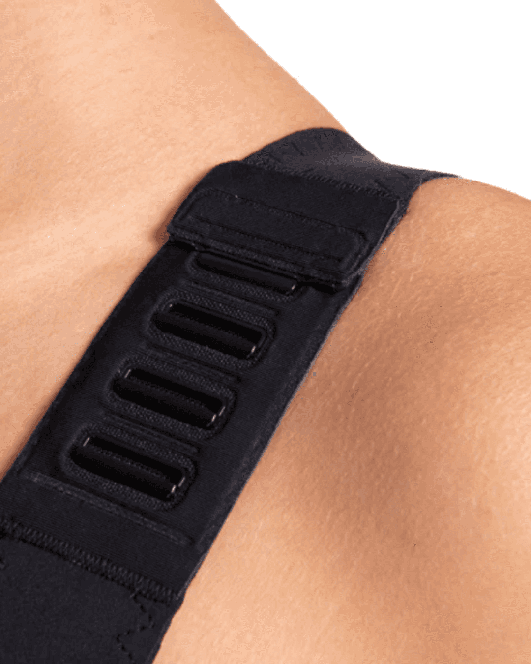 The LIPOELASTIC Pi Elite post surgery bra, a front fastening post surgery bra with a pink zip and adjustable clip straps