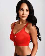 woman wearing the macom signature bra in red, post breast surgery compression bra suitable for most breast surgeries 