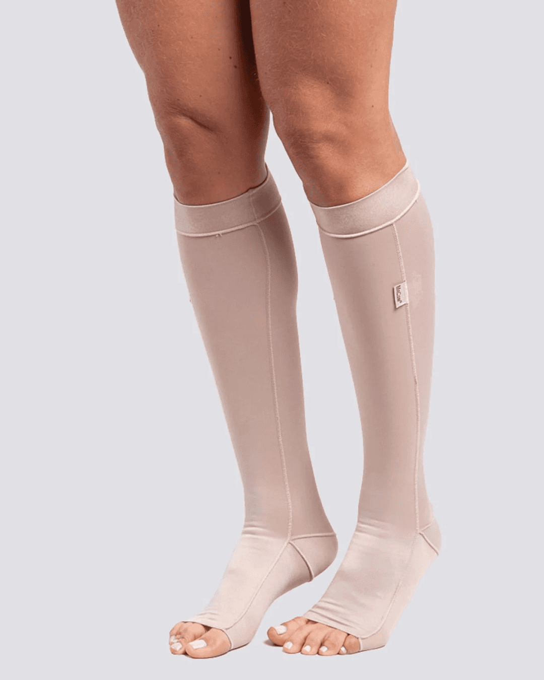 4-length design with closed heel, open toes, and outward-facing seams, ideal for swelling, DVT prevention, and post-surgery support.