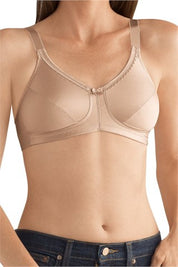 Amoena Rita Non-Wired Bra in Sand: A supportive, wire-free bra featuring two-section cups for enhanced support, adjustable straps, and bilateral COOLMAX® pockets to securely hold breast forms or shapers. Designed with a soft lace-trimmed neckline and moisture-wicking fabric for all-day comfort