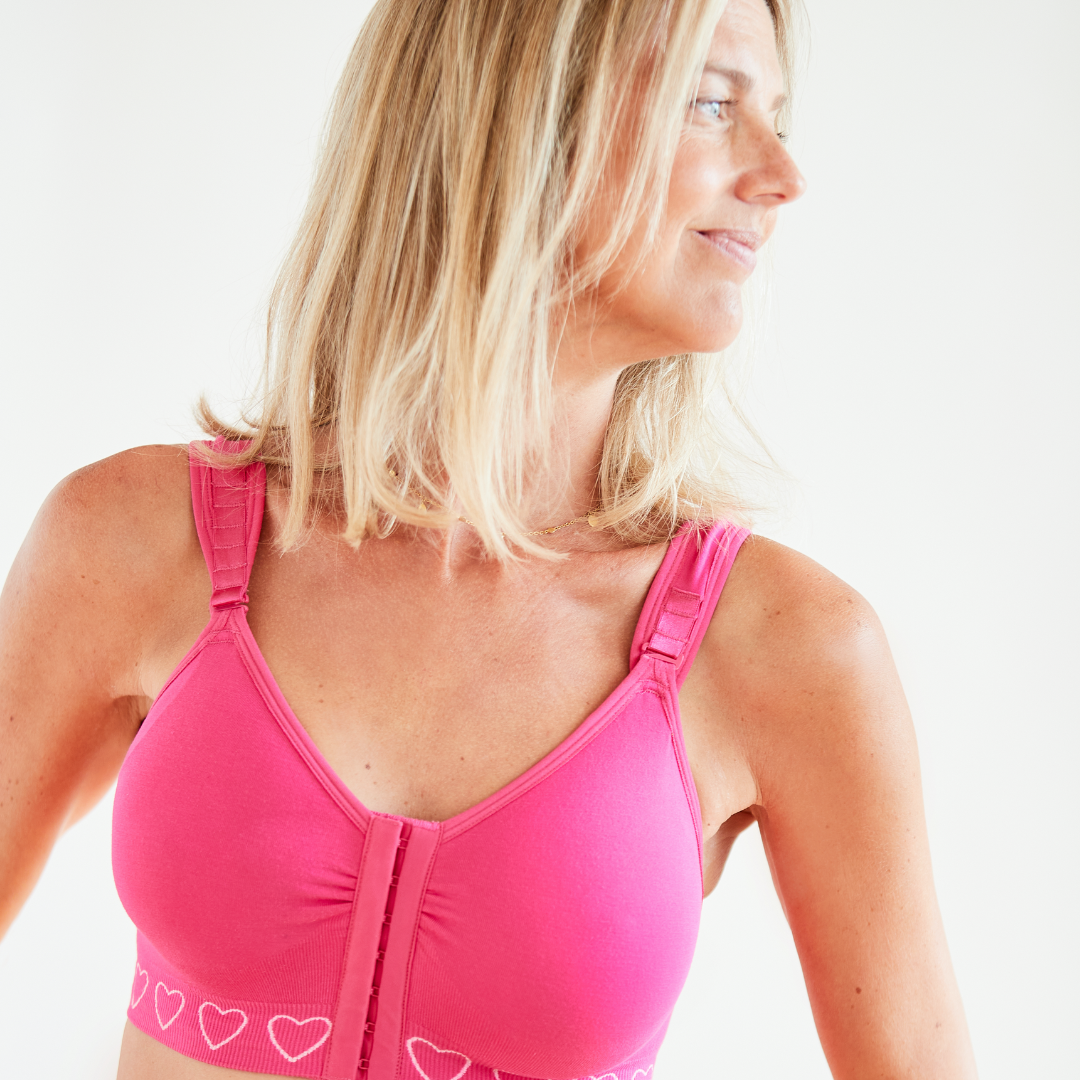 Cancer Research UK Post-Surgery Comfort Bra - Soft bamboo fabric bra designed for breast cancer patients. Offers comfort and support after mastectomy or breast cancer surgery. Available in white, black, and blush. Sizes range from Small to XXL. 100% net profits fund breast cancer research.