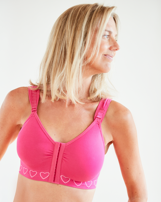 Cancer Research UK Post-Surgery Comfort Bra - Soft bamboo fabric bra designed for breast cancer patients. Offers comfort and support after mastectomy or breast cancer surgery. Available in white, black, and blush. Sizes range from Small to XXL. 100% net profits fund breast cancer research.