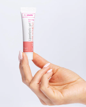image showing woman holding the lipoelastic scar gel, a scar treatment for post surgical procedures.