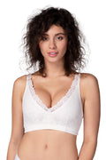 Woman wearing Lipoelastic Pi Premium in cream, second stage post surgery bra 