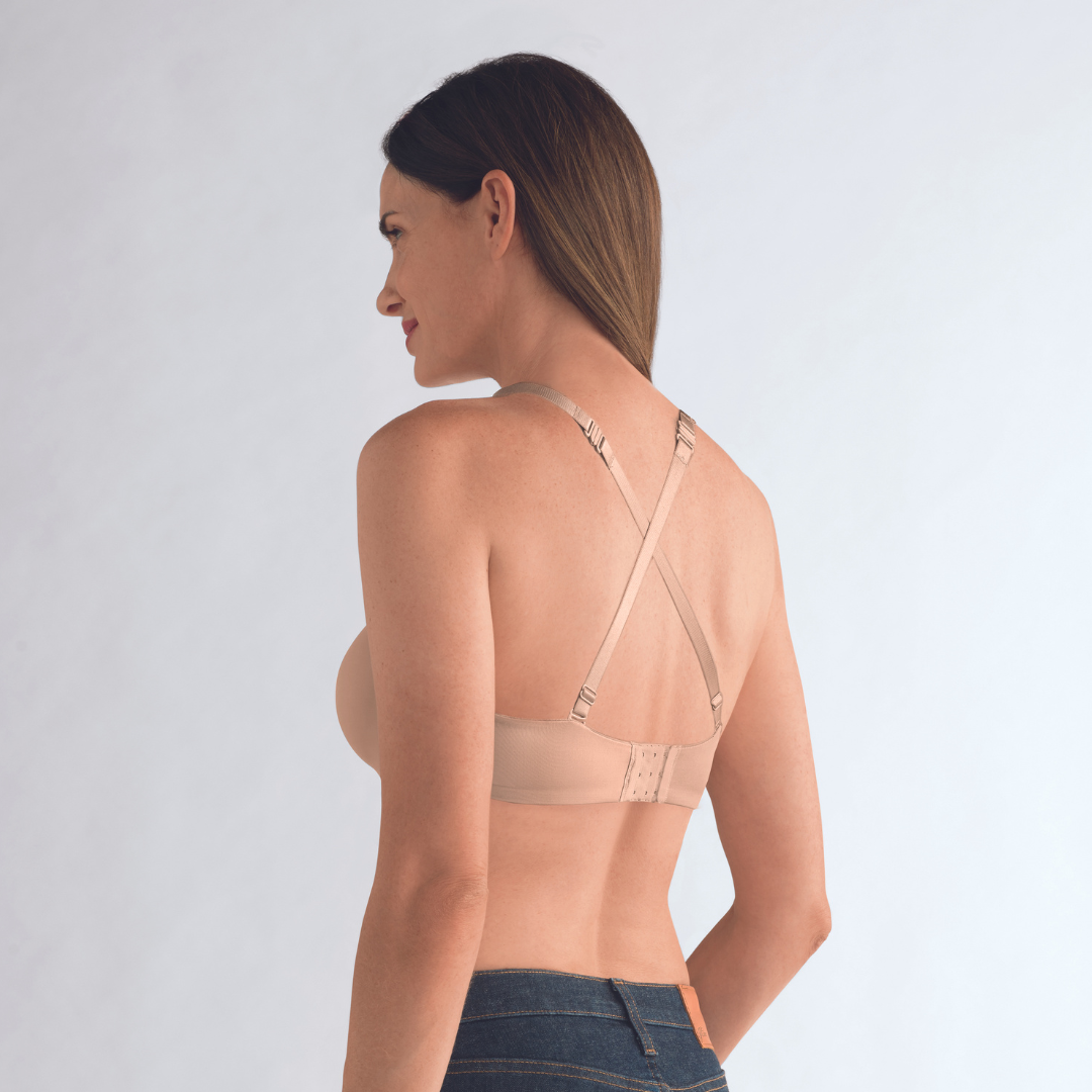 The Amoena Barbara is a strapless post-surgery bra with bi-lateral pockets for breast forms or prostheses. It offers versatile styling with multi-way straps and molded padded cups for a smooth silhouette and underwire support.
