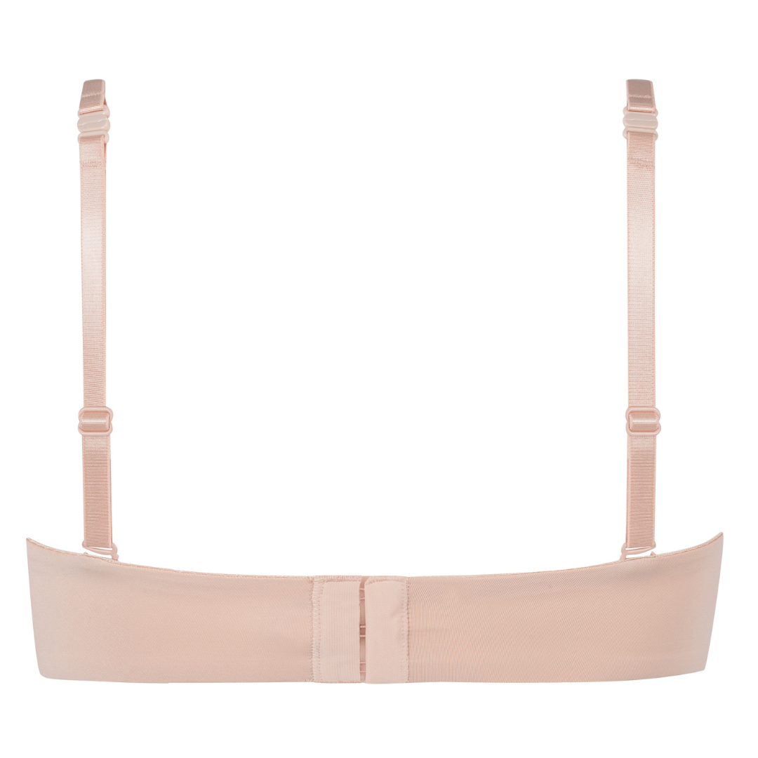 The Amoena Barbara is a strapless post-surgery bra with bi-lateral pockets for breast forms or prostheses. It offers versatile styling with multi-way straps and molded padded cups for a smooth silhouette and underwire support.