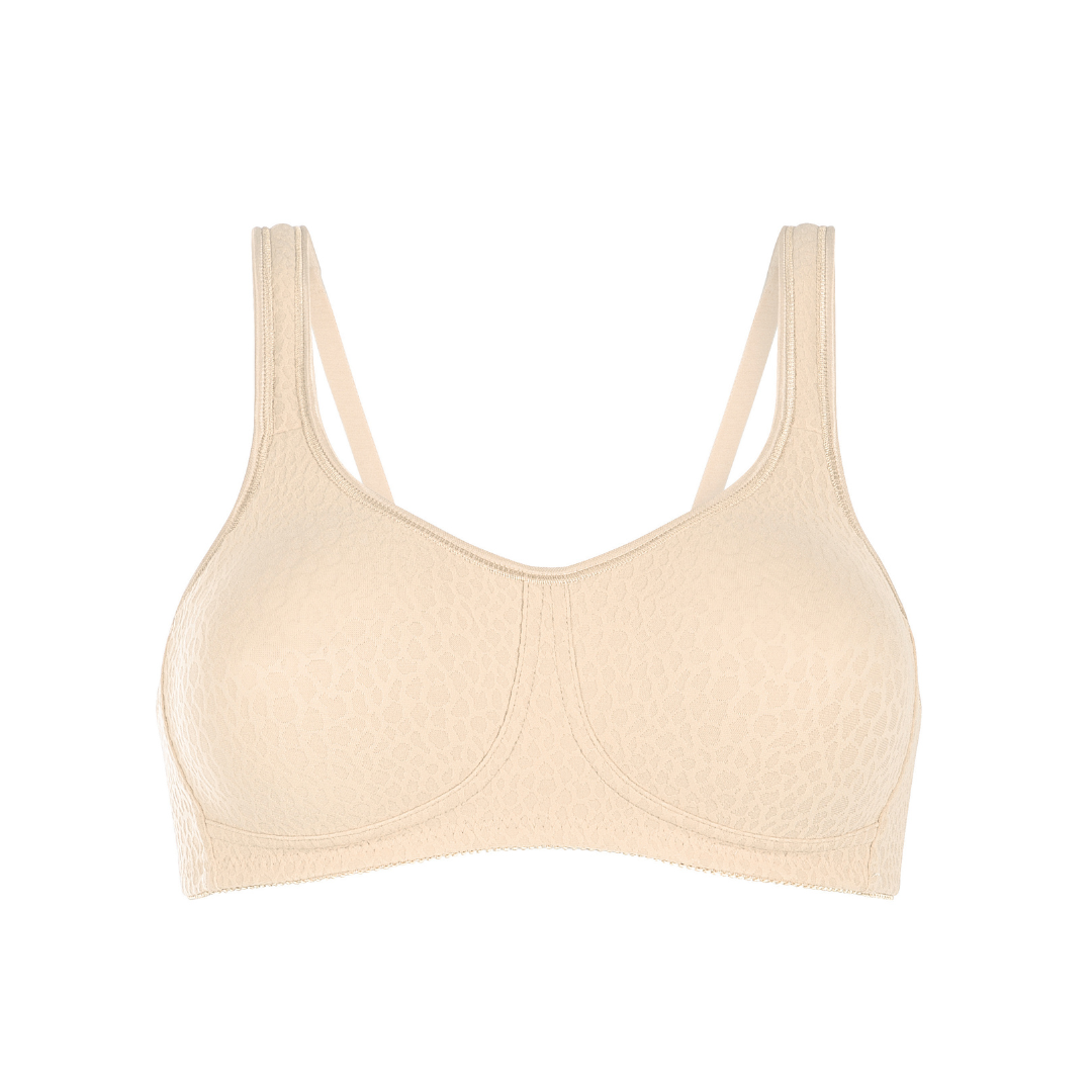 The Amoena Mona Bra is a popular choice with seamless, non-wired cups and bi-lateral pockets. Made with Meryl Microfibre for superior comfort and support. The straps are lightly padded and designed to be wider across the shoulders, reducing tension on the neck and shoulders. This bra is suitable for post-surgery wear and comes in white, black, and champagne