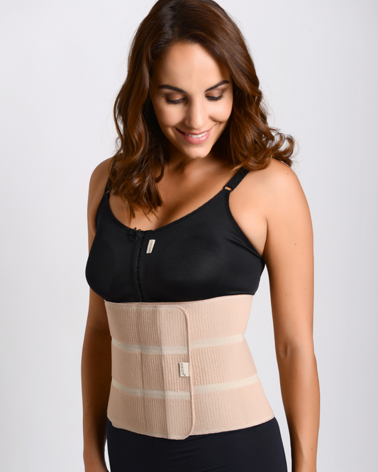 Image of a post-operative 3 Panel Binder for abdominal compression. This elasticated binder with velcro fastening provides flexible and adjustable compression. Ideal for post-abdominal surgeries, hernia, bariatric surgery, and as a back support. Enhance your recovery with this comfortable and supportive garment