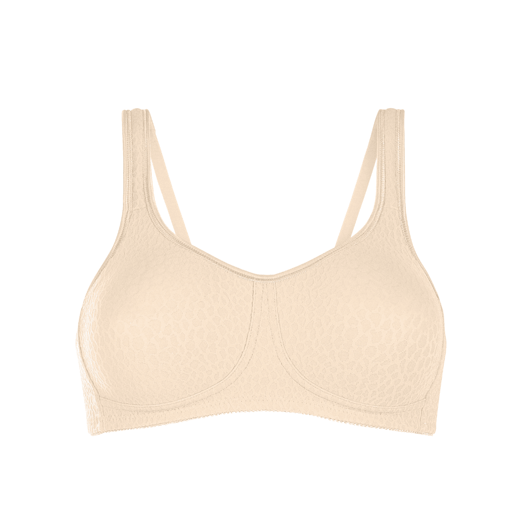 The Amoena Mona mastectomy Bra with pockets with seamless, non-wired cups. Made with Meryl Microfibre for superior comfort and support. The straps are lightly padded and designed to be wider across the shoulders, reducing tension on the neck and shoulders. This bra is suitable for post-surgery wear and comes in white, black, and champagne