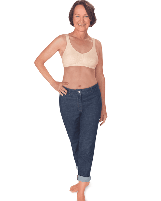 The Amoena Mona mastectomy Bra is a popular choice with seamless, non-wired cups and bi-lateral pockets. Made with Meryl Microfibre for superior comfort and support. The straps are lightly padded and designed to be wider across the shoulders, reducing tension on the neck and shoulders. This bra is suitable for post-surgery wear and comes in white, black, and champagne