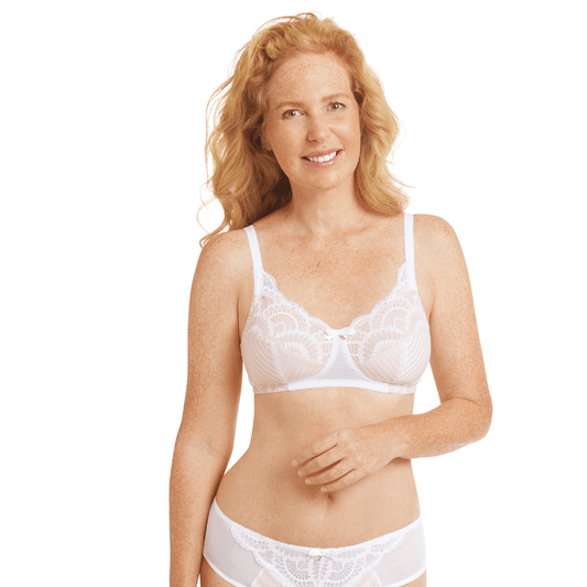 The Amoena Karolina Bra is a stylish and supportive choice for post-mastectomy comfort. Designed with bilateral pockets to securely hold breast forms or prostheses, this bra ensures a balanced silhouette. The Karolina Bra features a beautiful lace overlay, adjustable straps for a personalized fit, and a comfortable. Experience confidence and femininity with the Amoena Karolina Bra.