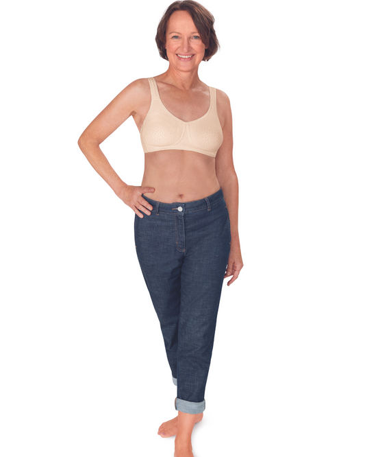 The Amoena Mona Bra is a popular choice with seamless, non-wired cups and bi-lateral pockets. Made with Meryl Microfibre for superior comfort and support. The straps are lightly padded and designed to be wider across the shoulders, reducing tension on the neck and shoulders. This bra is suitable for post-surgery wear and comes in white, black, and champagne