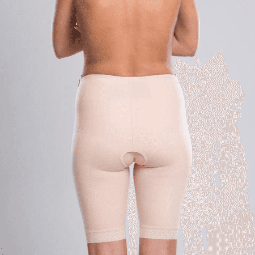 Discover the TF Comfort Garment, ideal for post-operative recovery after liposuction. Suitable for lower tummy, buttocks, pelvic area, hips, and thighs. Offers optimal compression and support. Double-lined fabric reinforces the lower abdomen. Soft lace hem prevents rolling or squeezing. Convenient zipper closures on both sides for easy dressing. Experience comfort and confidence in your recovery journey